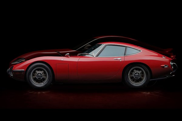 1967 Toyota 2000 GT with silhouette of 2020 Toyota Supra